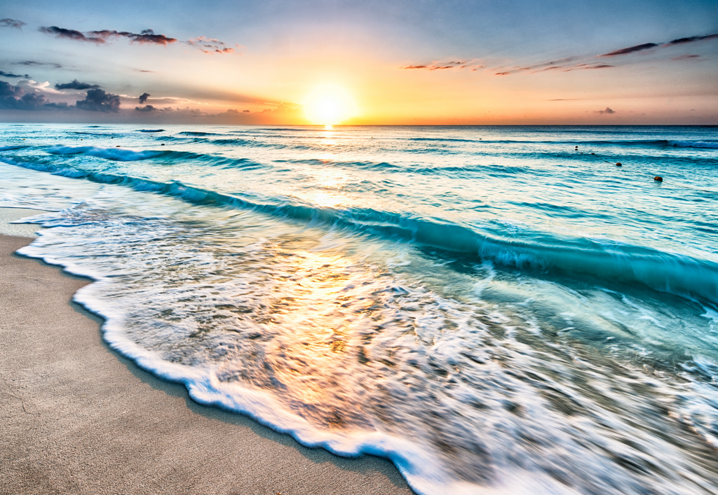 blue ocean and sunset sandy beach iteracare